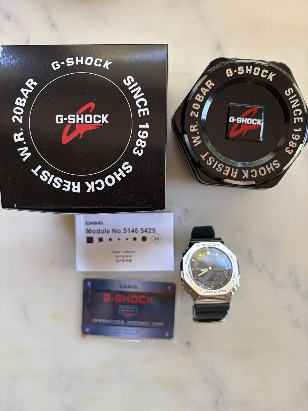 Casio G-SHOCK Silver Watch with Blue, Pink and Purple Dial